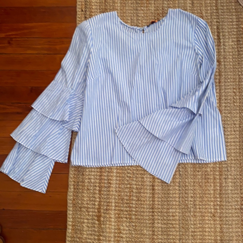 Blue and white striped shirt with wide sleeves